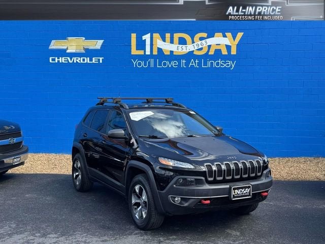 2017 Jeep Cherokee Trailhawk 4x4 in Black — front three-quarter view